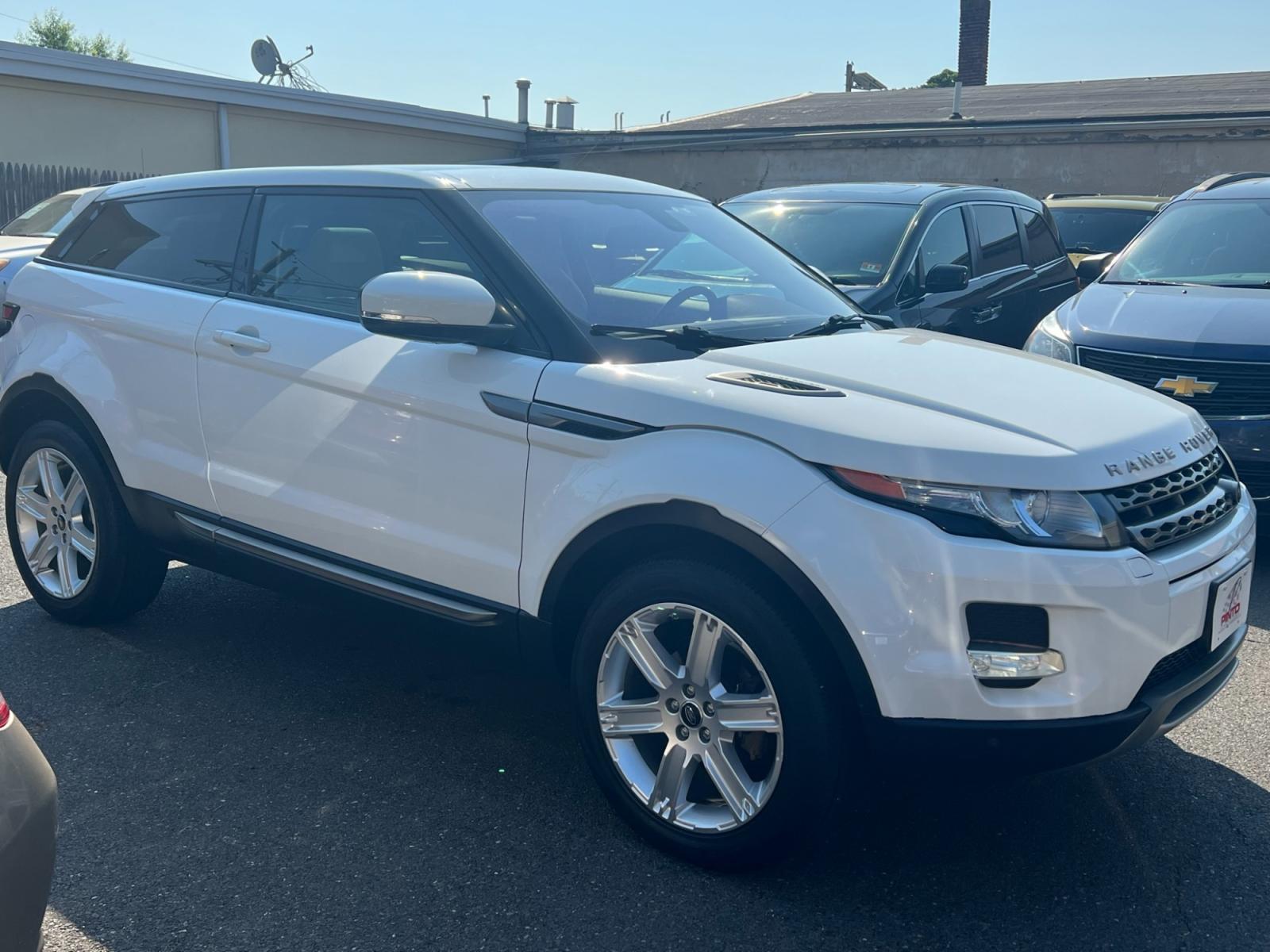 2013 /Beige Land Rover Range Rover Evoque Pure Plus 3-Door (SALVP1BG3DH) with an 2.0L L4 DOHC 24V TURBO engine, 6-Speed Automatic transmission, located at 1018 Brunswick Ave, Trenton, NJ, 08638, (609) 989-0900, 40.240086, -74.748085 - This Range Rover Evoque is beautiful in every way and has been very well maintained and ready for the next owner! Amazing color combo and super clean SUV! Call Anthony to set up an appointment ASAP, 609-273-5100 - Photo #3
